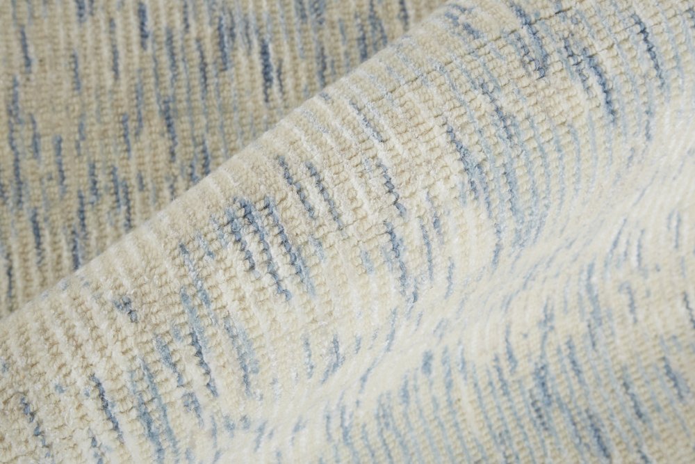 10' X 13' Ivory Blue And Tan Abstract Hand Woven Area Rug