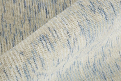 10' X 13' Ivory Blue And Tan Abstract Hand Woven Area Rug