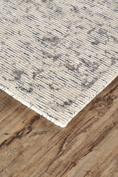 2' X 3' Ivory And Tan Abstract Hand Woven Area Rug