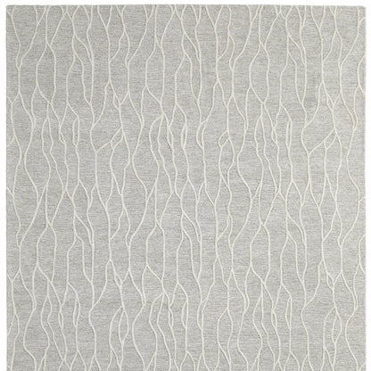 5' X 8' Taupe Black And Gray Wool Abstract Tufted Handmade Stain Resistant Area Rug