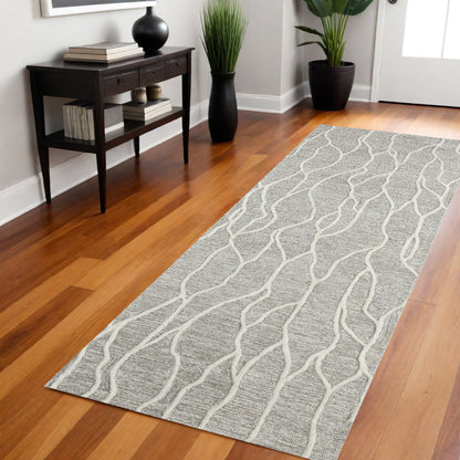 5' X 8' Taupe Black And Gray Wool Abstract Tufted Handmade Stain Resistant Area Rug