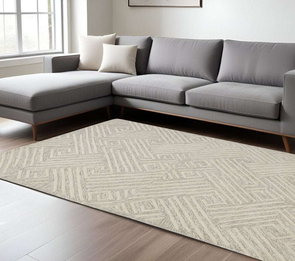 8' X 11' Tan And Ivory Wool Geometric Tufted Handmade Stain Resistant Area Rug