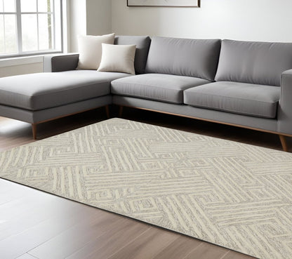 8' X 11' Tan And Ivory Wool Geometric Tufted Handmade Stain Resistant Area Rug