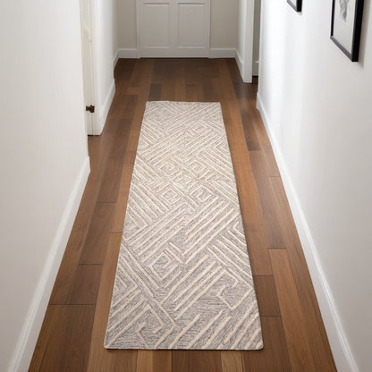 5' X 8' Tan And Ivory Wool Geometric Tufted Handmade Stain Resistant Area Rug