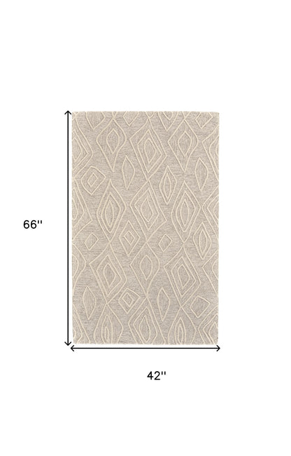 5' X 8' Tan And Ivory Wool Geometric Tufted Handmade Stain Resistant Area Rug