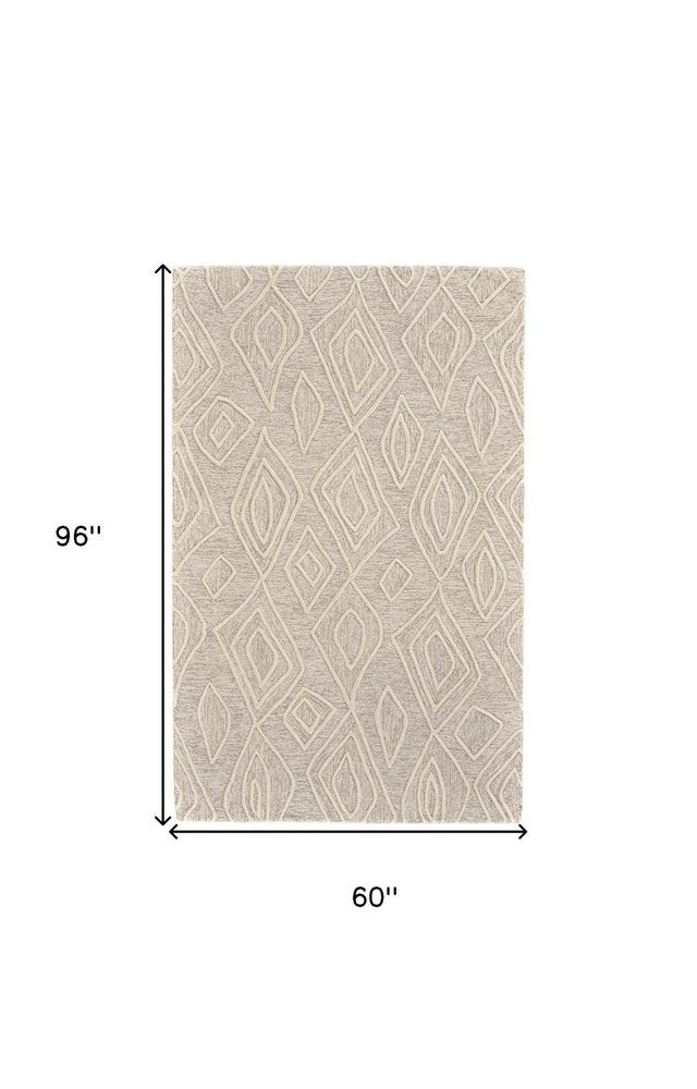 8' X 11' Tan And Ivory Wool Geometric Tufted Handmade Stain Resistant Area Rug