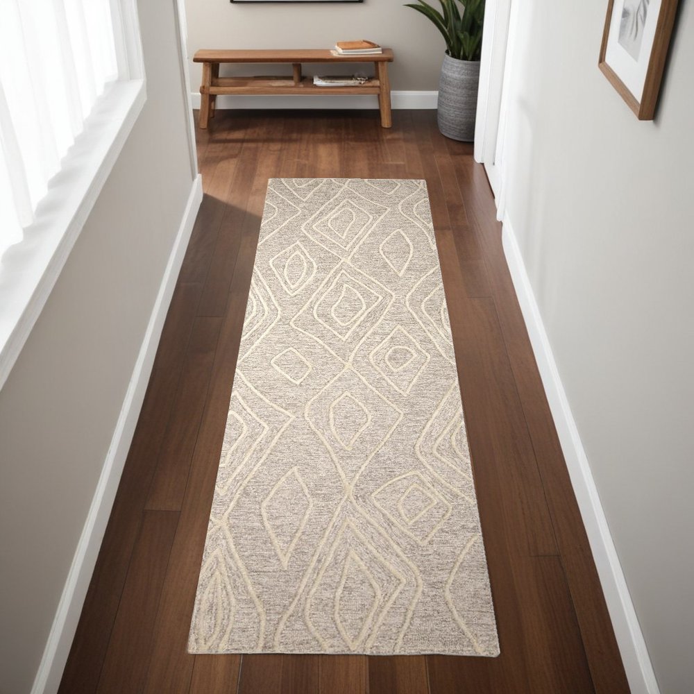 8' X 11' Tan And Ivory Wool Geometric Tufted Handmade Stain Resistant Area Rug