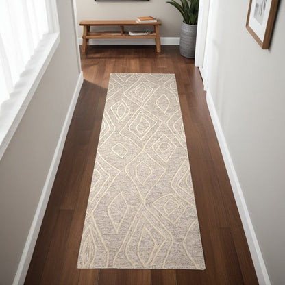 8' X 11' Tan And Ivory Wool Geometric Tufted Handmade Stain Resistant Area Rug