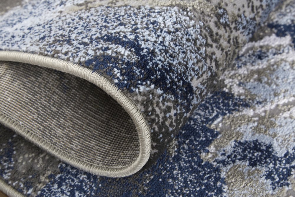 7' X 10' Blue Gray And White Abstract Area Rug