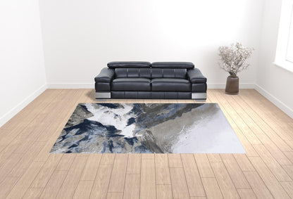 8' X 11' Blue Gray And White Abstract Area Rug