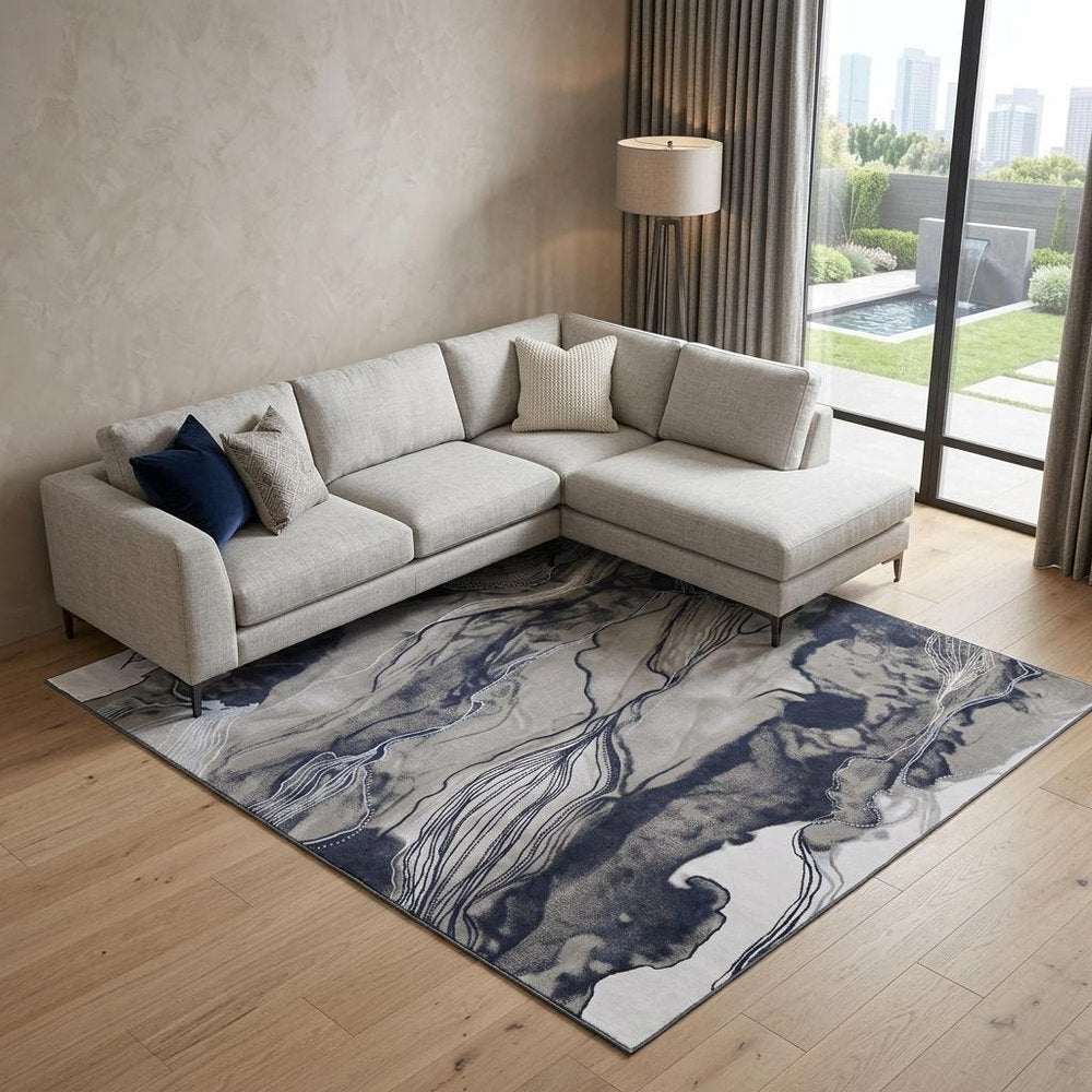 5' X 7' Blue Gray And Ivory Abstract Power Loom Stain Resistant Area Rug