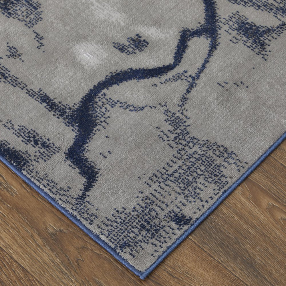 7' X 10' Blue Gray and Ivory Abstract Power Loom Non Skid Area Rug