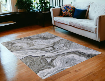 7' X 10' Ivory Blue and Gray Abstract Power Loom Area Rug