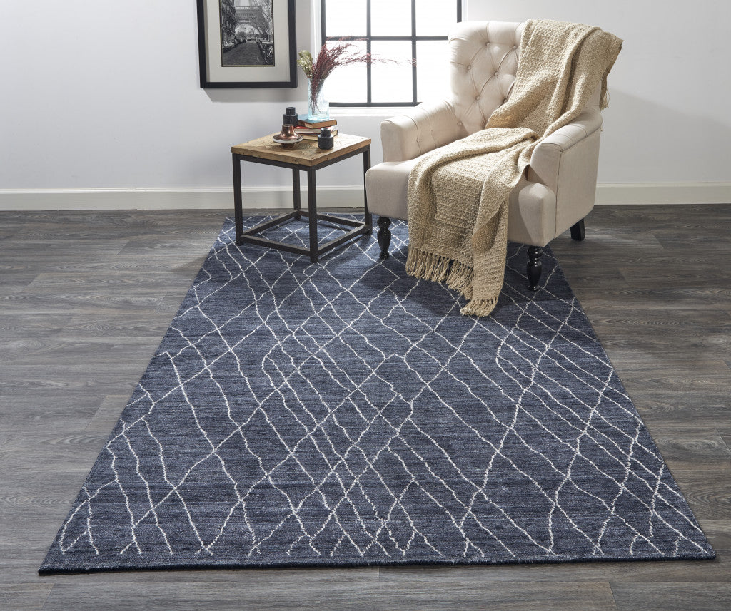 5' X 8' Blue And Ivory Abstract Hand Woven Area Rug