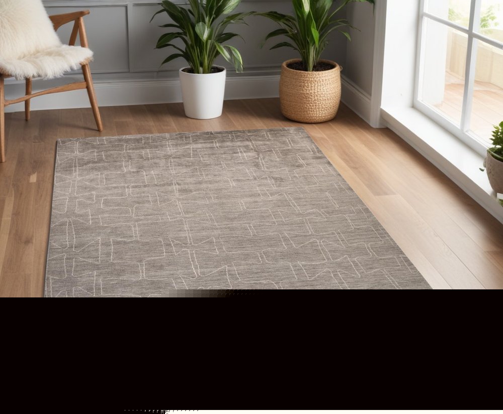 4' X 6' Gray and Ivory Abstract Hand Woven Area Rug