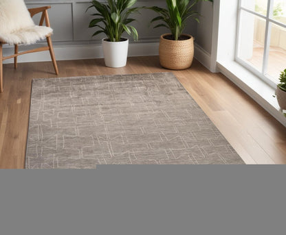 4' X 6' Gray and Ivory Abstract Hand Woven Area Rug