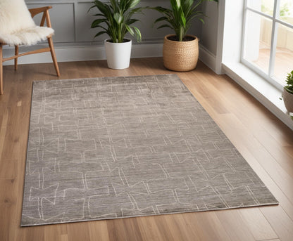 2' X 3' Gray and Ivory Abstract Hand Woven Area Rug