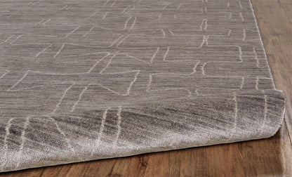 2' X 3' Gray and Ivory Abstract Hand Woven Area Rug