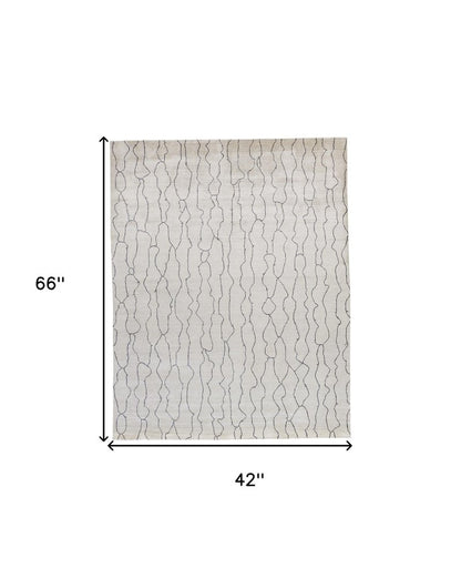 5' X 8' Ivory And Gray Abstract Hand Woven Area Rug