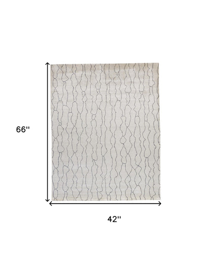 4' X 6' Ivory And Gray Abstract Hand Woven Area Rug