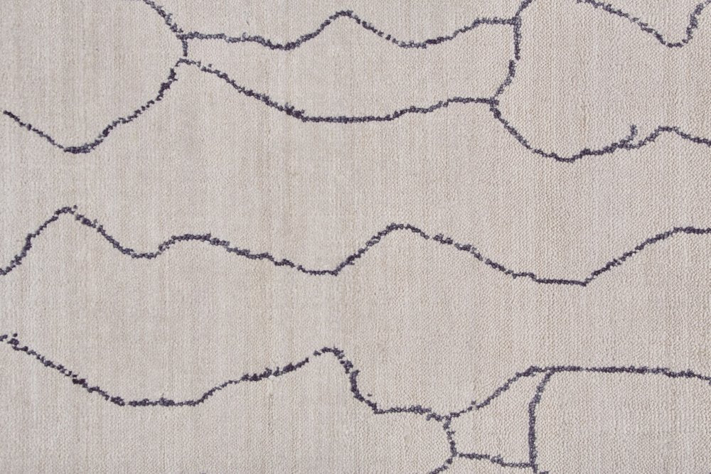 5' X 8' Ivory And Gray Abstract Hand Woven Area Rug