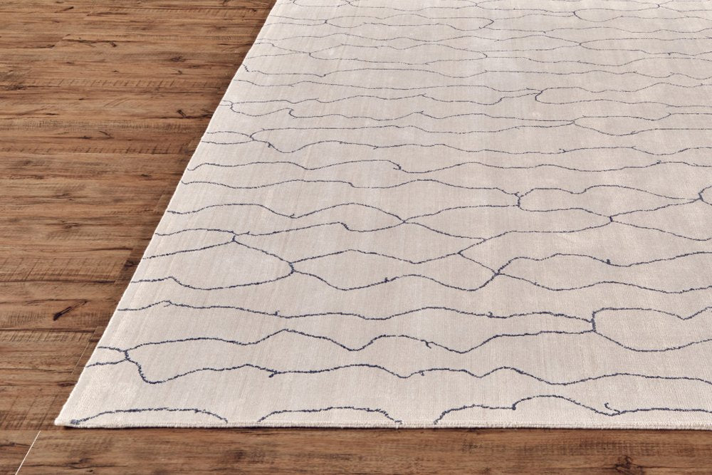 5' X 8' Ivory And Gray Abstract Hand Woven Area Rug