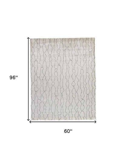 5' X 8' Ivory And Gray Abstract Hand Woven Area Rug