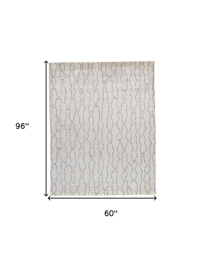 4' X 6' Ivory And Gray Abstract Hand Woven Area Rug