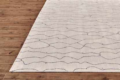 5' X 8' Ivory And Gray Abstract Hand Woven Area Rug