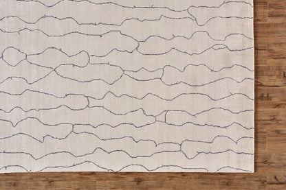 5' X 8' Ivory And Gray Abstract Hand Woven Area Rug