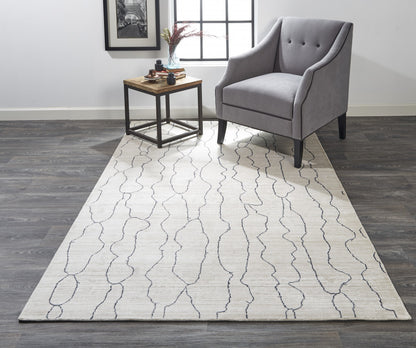 4' X 6' Ivory And Gray Abstract Hand Woven Area Rug