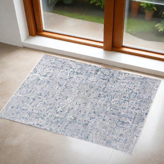 5' X 8' Blue and Gray Abstract Distressed Area Rug With Fringe