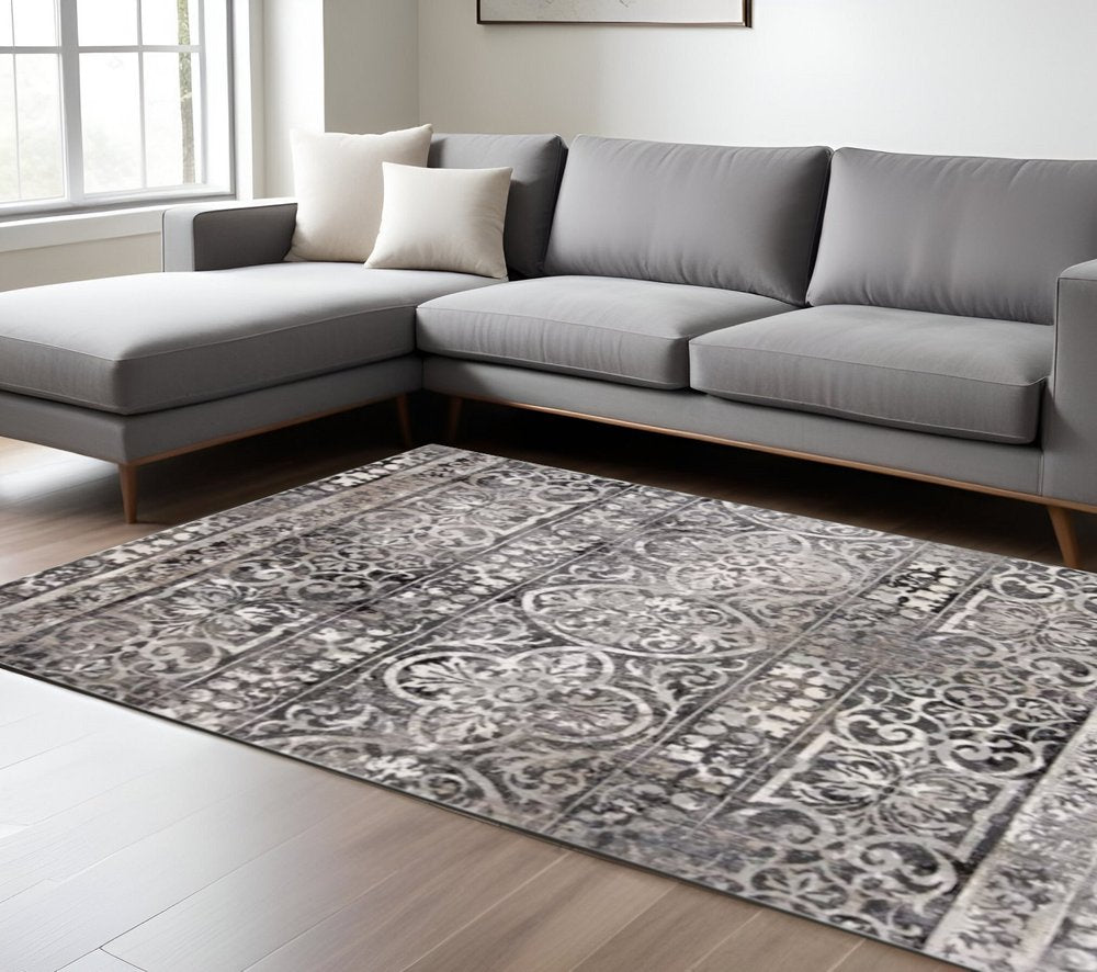 5' X 8' Gray Ivory And Taupe Abstract Stain Resistant Area Rug