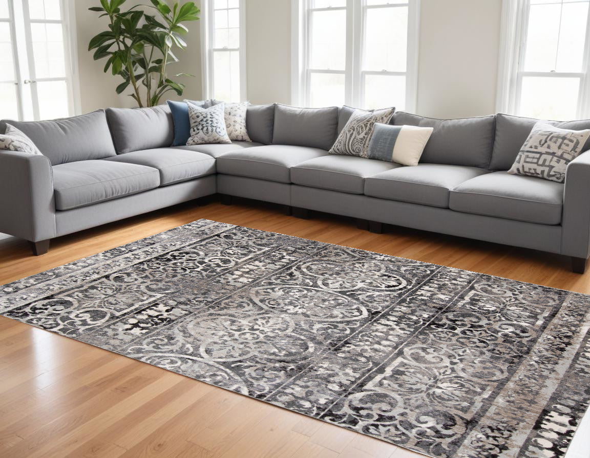 4' X 6' Gray Ivory And Taupe Abstract Stain Resistant Area Rug