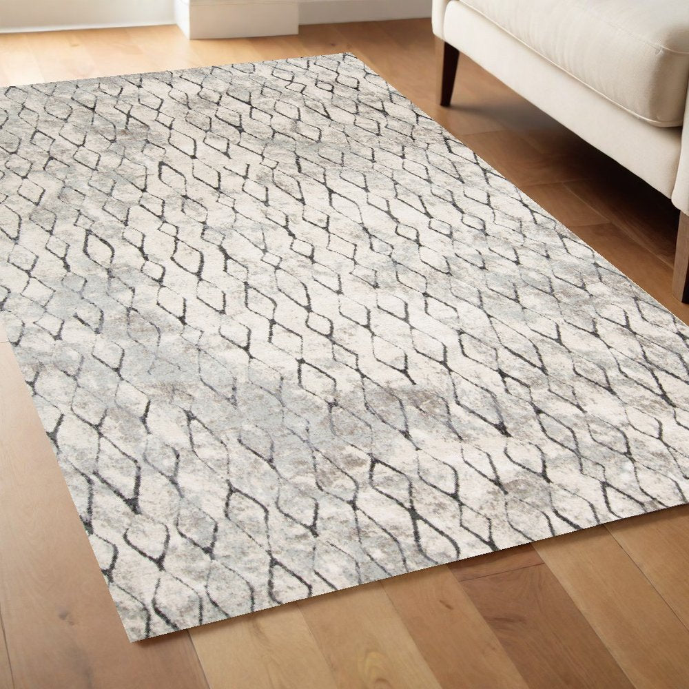 7' X 10' Gray And Ivory Geometric Area Rug