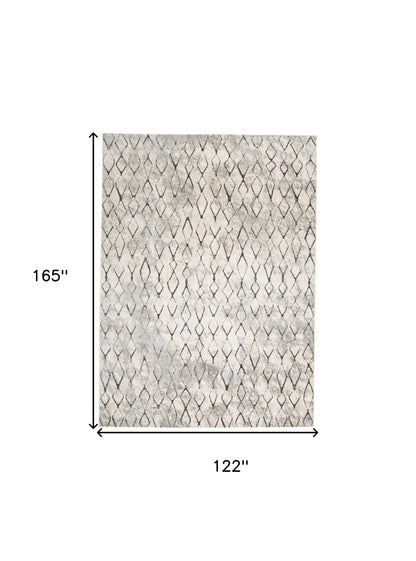 5' X 8' Ivory Gray And Taupe Abstract Stain Resistant Area Rug