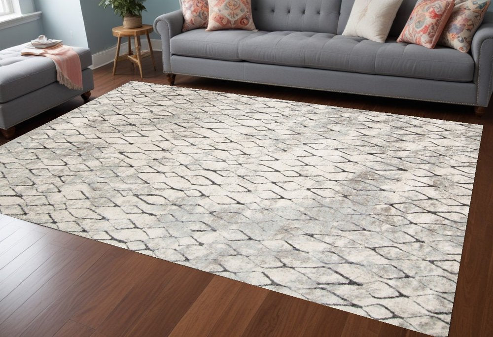 7' X 10' Gray And Ivory Geometric Area Rug