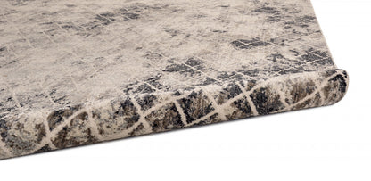 4' X 6' Ivory Gray And Taupe Abstract Stain Resistant Area Rug