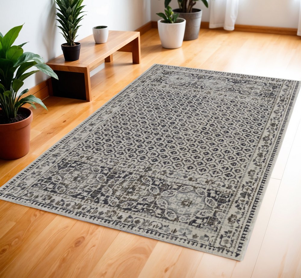 4' X 6' Ivory Taupe And Gray Abstract Stain Resistant Area Rug