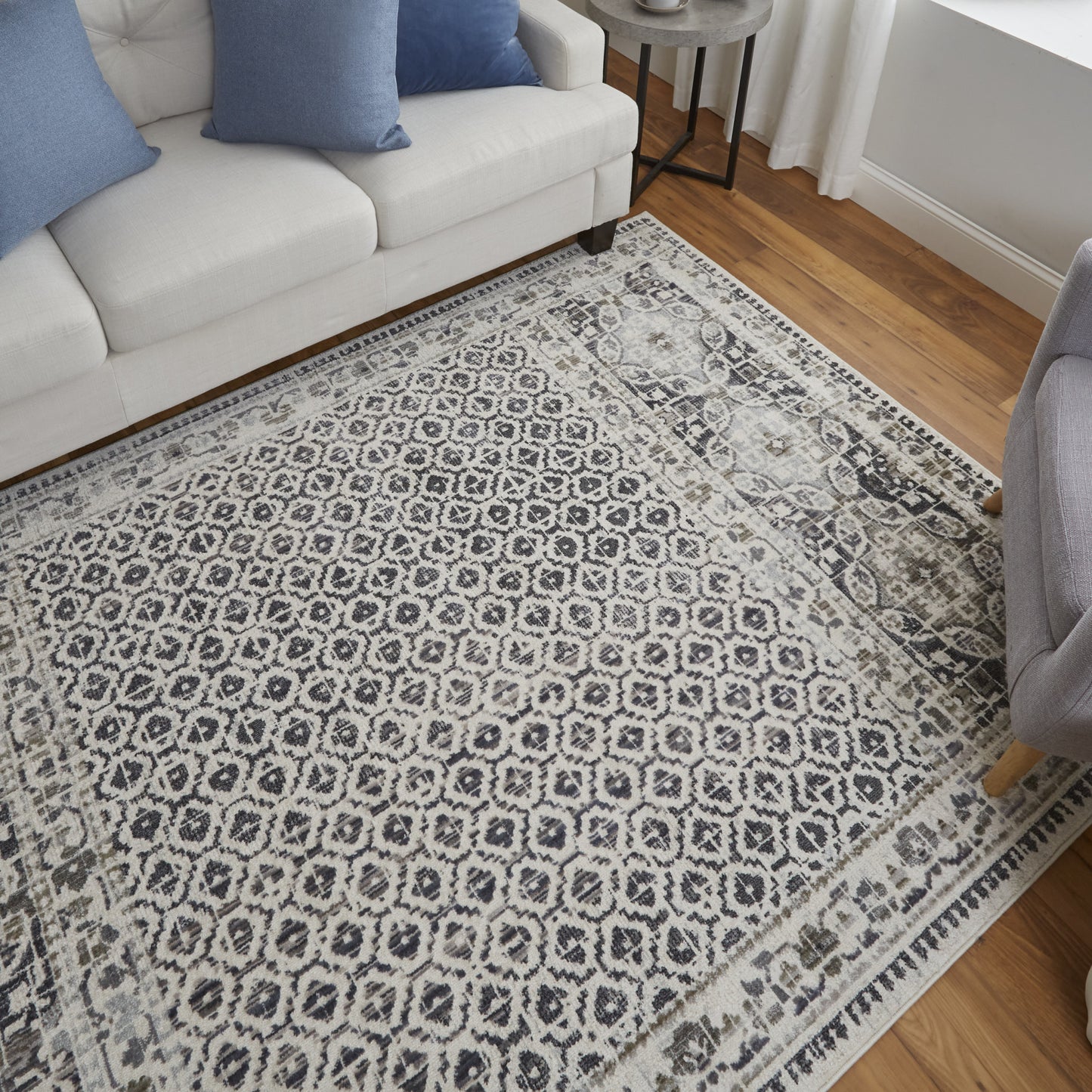 5' X 8' Ivory Taupe And Gray Abstract Stain Resistant Area Rug