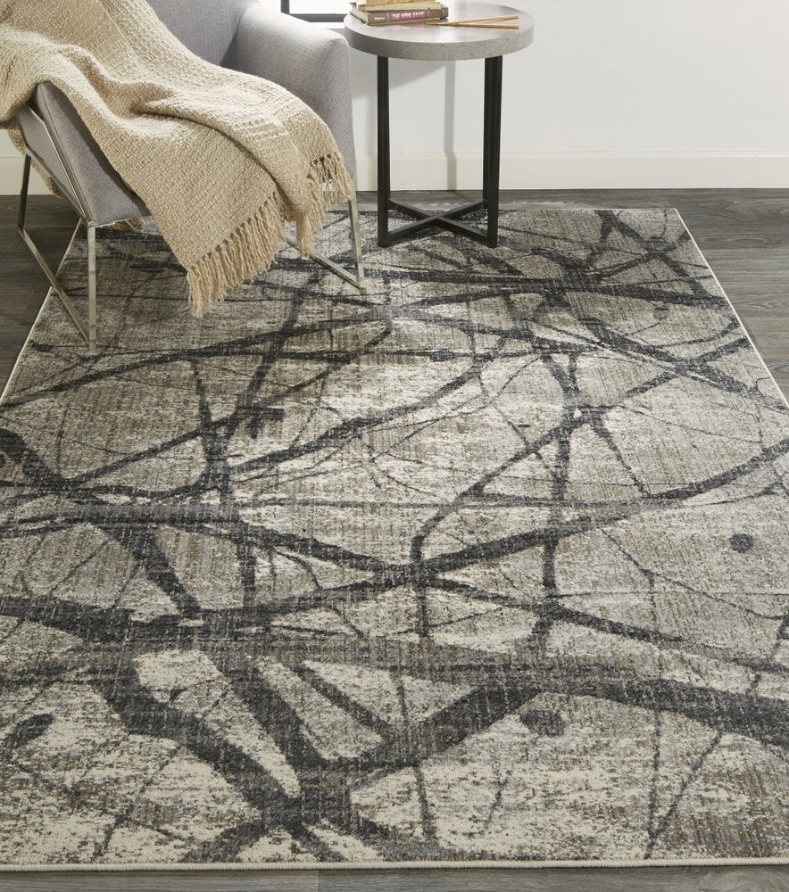 5' X 8' Taupe Gray And Ivory Abstract Stain Resistant Area Rug