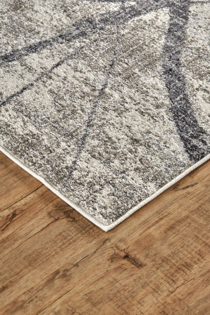 5' X 8' Taupe Gray And Ivory Abstract Stain Resistant Area Rug