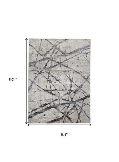 5' X 8' Taupe Gray And Ivory Abstract Stain Resistant Area Rug