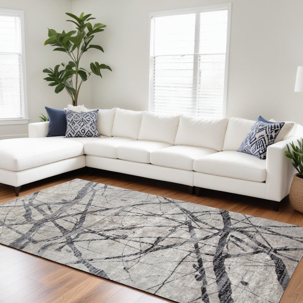 4' X 6' Taupe Gray And Ivory Abstract Stain Resistant Area Rug