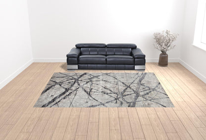 4' X 6' Taupe Gray And Ivory Abstract Stain Resistant Area Rug