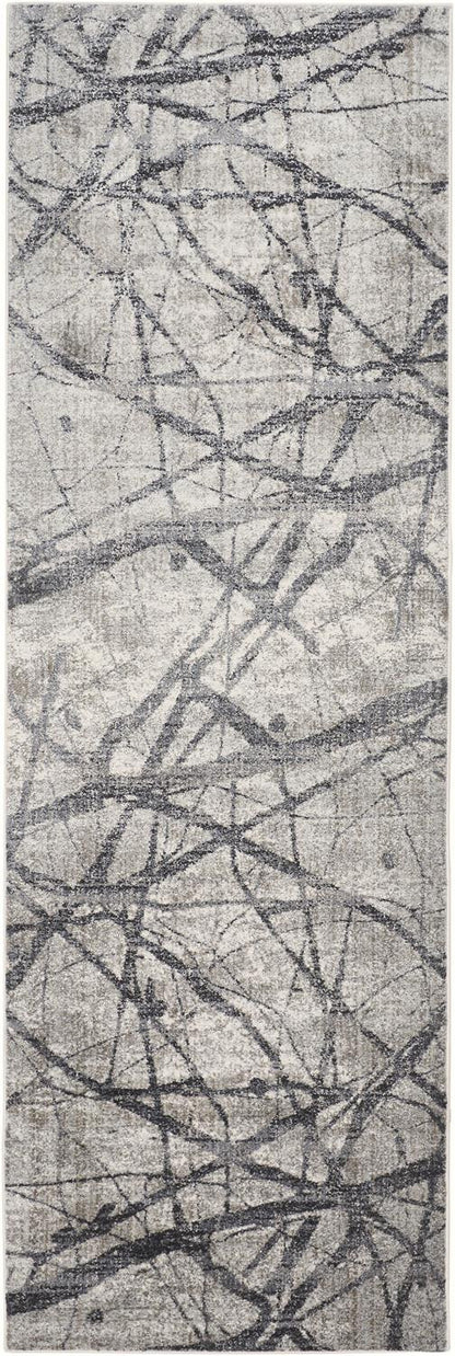 4' X 6' Taupe Gray And Ivory Abstract Stain Resistant Area Rug