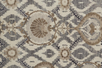 5' X 8' Ivory Gray And Taupe Wool Floral Hand Knotted Stain Resistant Area Rug
