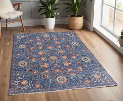 8' X 10' Blue And Red Wool Floral Hand Knotted Stain Resistant Area Rug