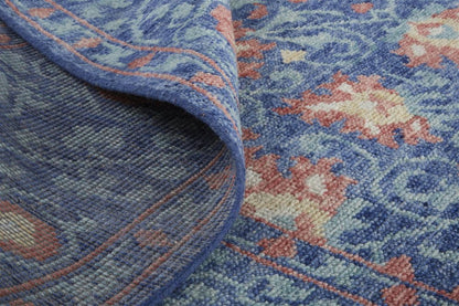 8' X 10' Blue And Red Wool Floral Hand Knotted Stain Resistant Area Rug