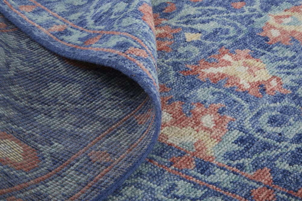 5' X 8' Blue And Red Wool Floral Hand Knotted Stain Resistant Area Rug